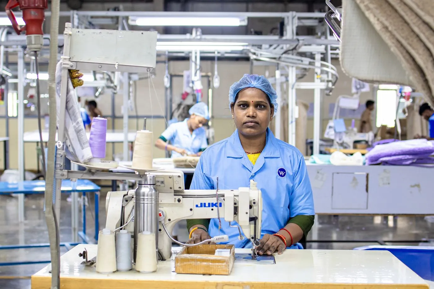 Garment being checked at a quality control station