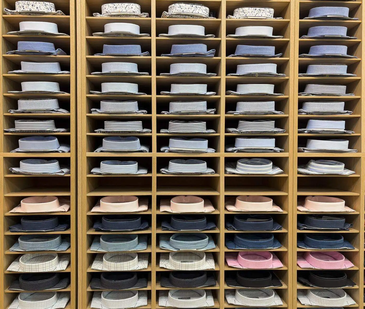 Folded shirts on display shelving